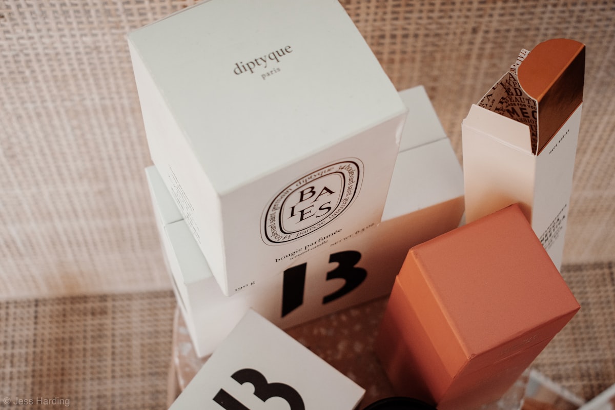 Premium beauty product packaging on a neutral background
