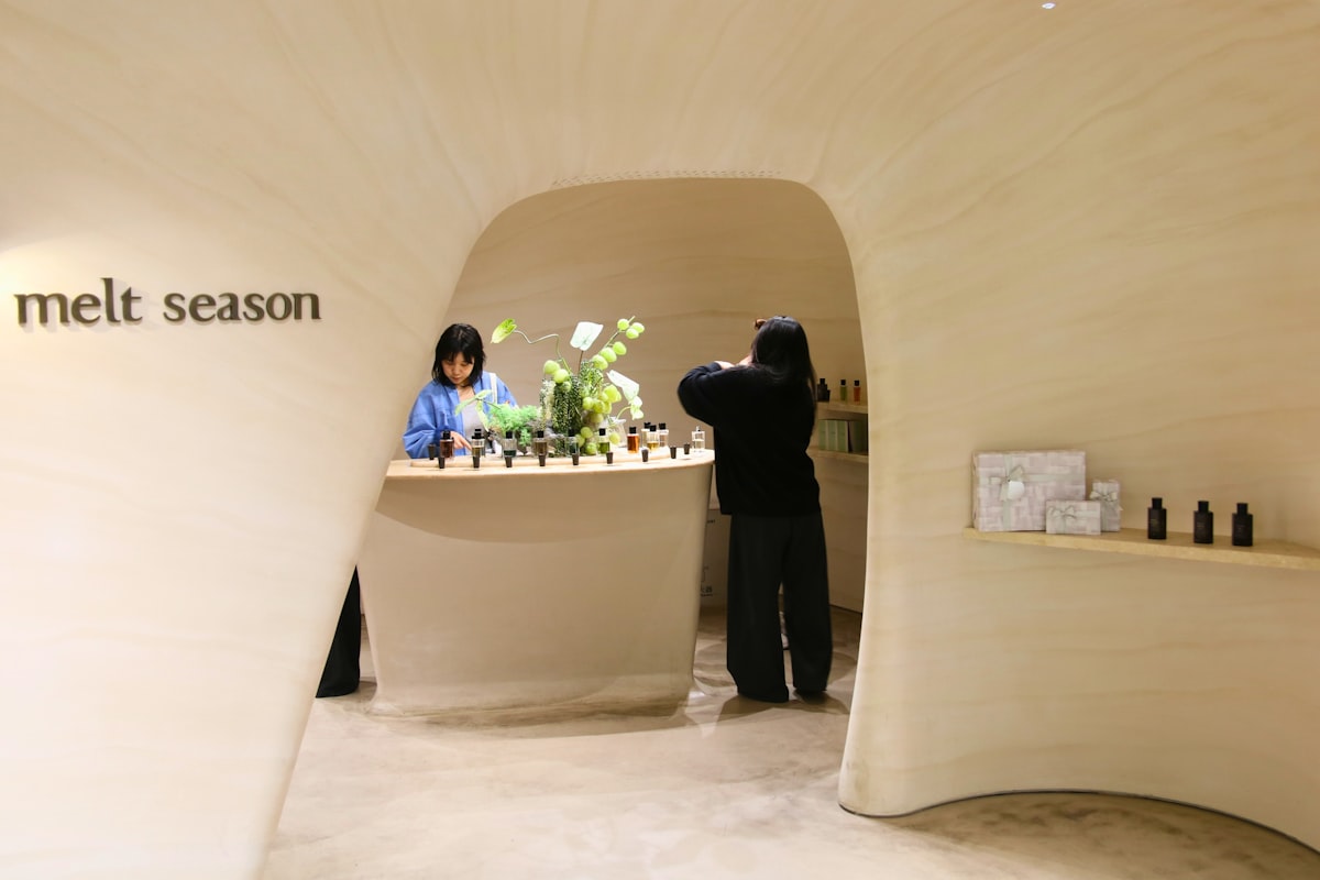 Beauty products arranged on retail display shelving